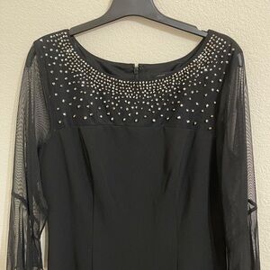 Elegant Black Dress with Embellished Neckline